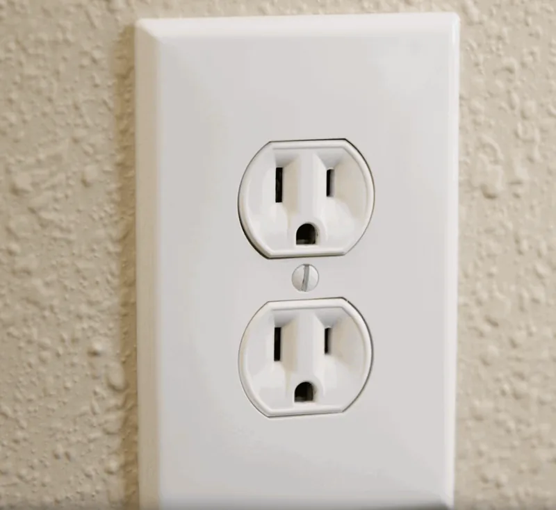 Grounded 3-prong outlet used to connect the Terra Grounding Bed Sheet